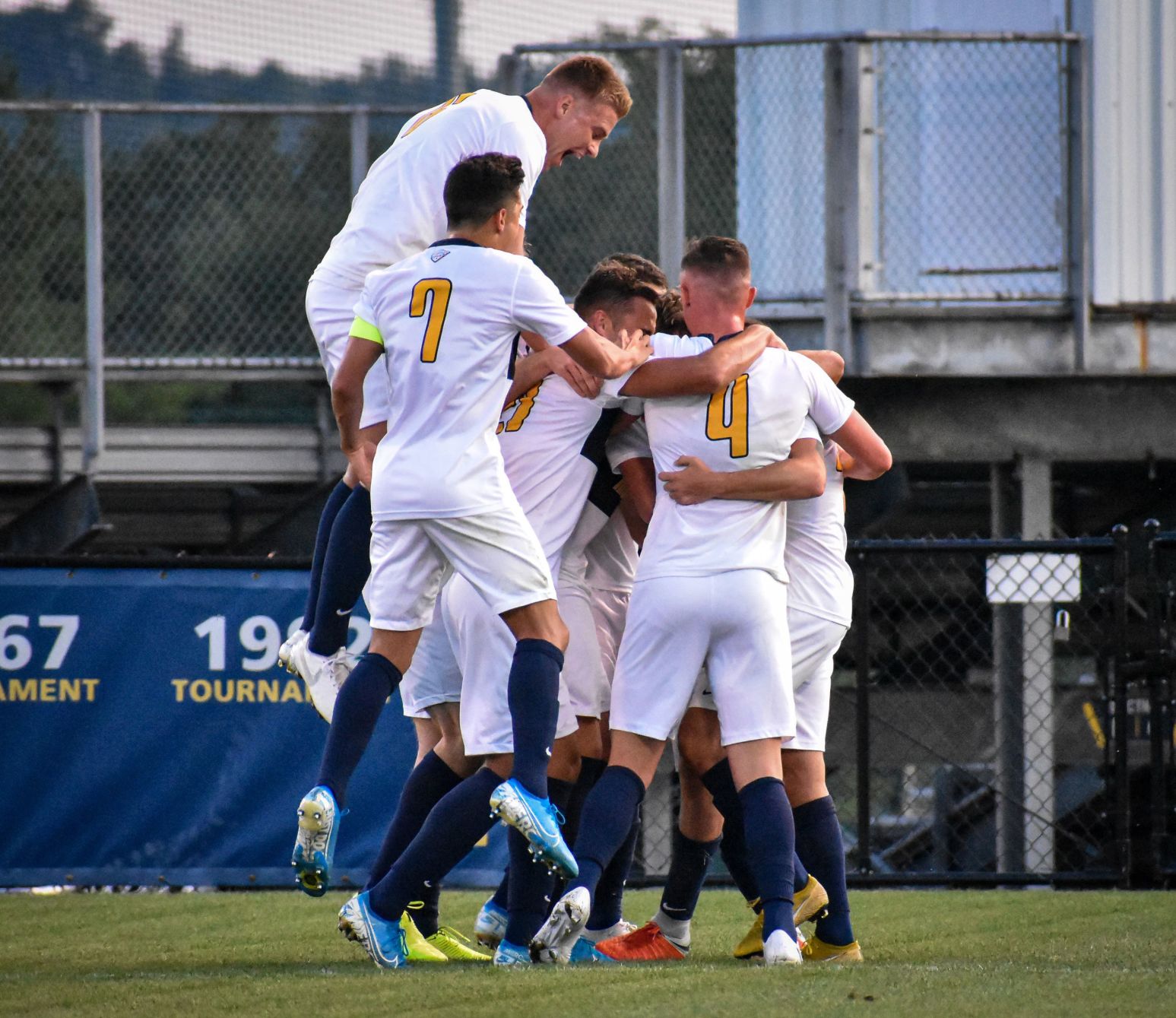 The Mountaineers celebrate after scoring the first goal of the game against Wright State.